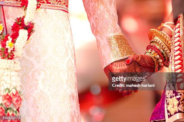colorful hindu wedding in india - love emotion stock pictures, royalty-free photos & images