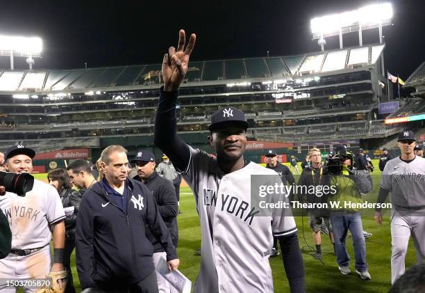 Domingo German of the New York Yankees celebrates his no-hit perfect game against the Oakland Athletics, defeating them 11-0 at RingCentral Coliseum...