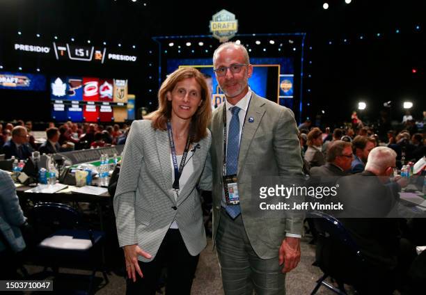 Assistant general manager for the Vancouver Canucks, Cammi Granato, poses with her brother, Don Granato, head coach of the Buffalo Sabres during the...