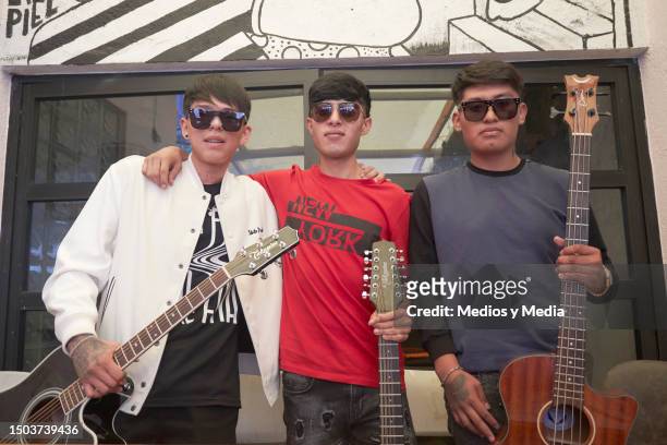 Emanuel Silva, David Farias and Fernando Acosta of Alto Linaje Band pose for a photo during a press conference at Casa Amatlan on June 28, 2023 in...