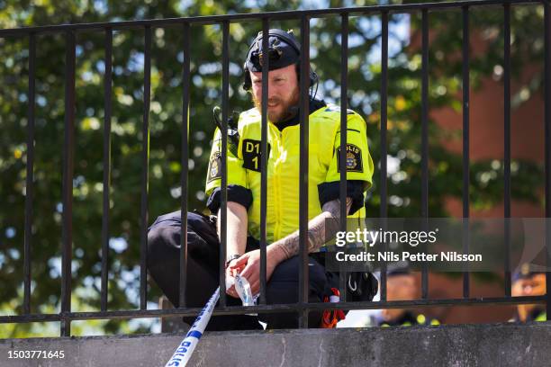 Police during a protest where a koran was burned at the Stockholm mosque on June 28, 2023 in Stockholm, Sweden. Whilst Muslims celebrate the most...