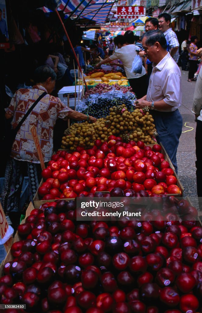 Shopping at the local street market in Mong Kok, Hong Kong