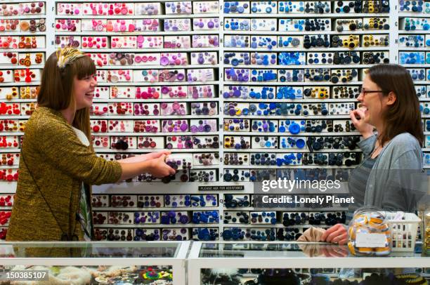 buttons at britex fabrics store near union square. - lonely planet collection stock pictures, royalty-free photos & images