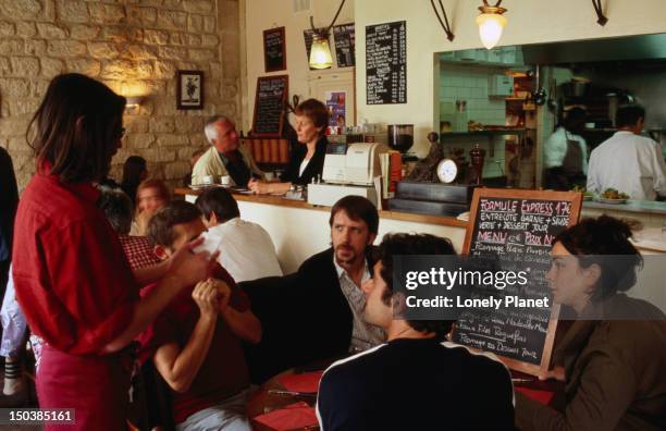 inside l'encrier restaurant. - encrier stock pictures, royalty-free photos & images