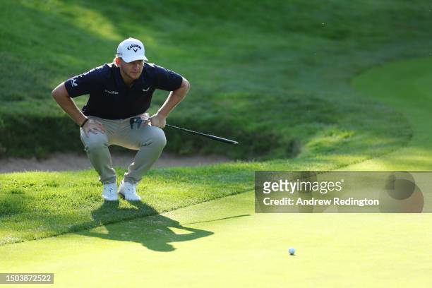 Nick Bachem of Germany lines up a putt on the 10th green during Day One of the Betfred British Masters hosted by Sir Nick Faldo 2023 at The Belfry on...