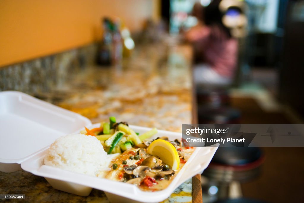 Mahi with lemon caper saute at Honokowai okazuya deli & cafe, West Maui. Eat in or take away, most food is served in foam or plastic containers in Hawaii; yet another instance of America's throw away culture.