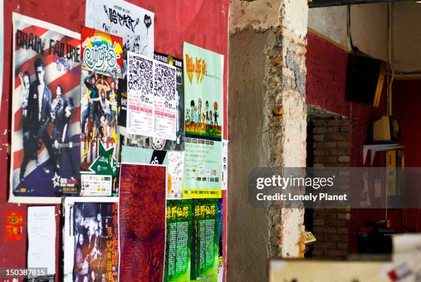 band posters inside mao livehouse. - lonely planet collection stock-fotos und bilder