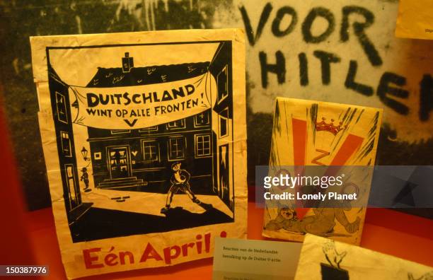 anti-hitler propoganda, display at the verzetmuseum, plantage kerklaan 61a. - propoganda stock pictures, royalty-free photos & images
