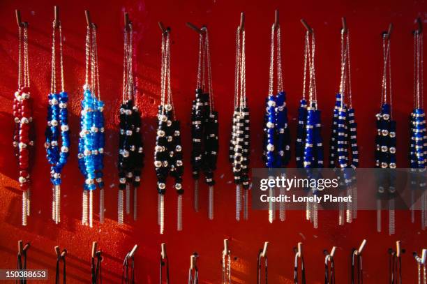 worry beads on display in rethymno, rethymno province, crete. - greek worry beads stock pictures, royalty-free photos & images