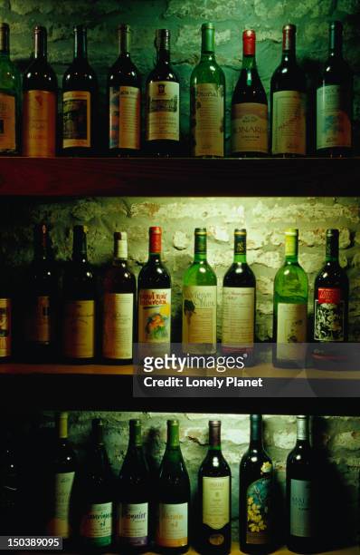 collection of argentinian wines on display at club del vino, palermo vlejo. - lonely planet collection foto e immagini stock