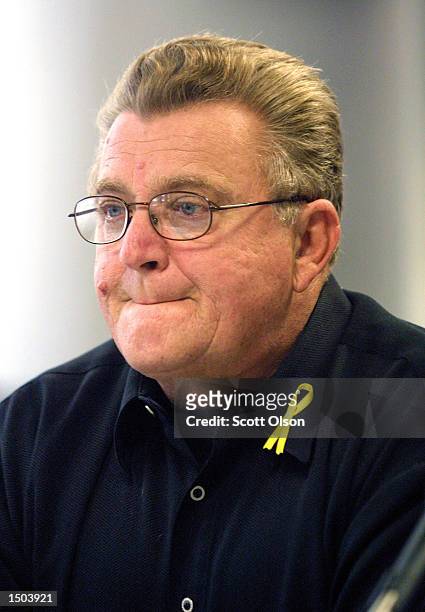 Joe Hackett fights back tears as he testifies at a clemency hearing for Milton Johnson October 18, 2002 in Chicago, Illinois. Johnson was convicted...