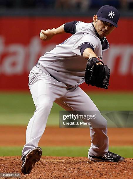 Pitcher Clay Rapada of the New York Yankees pitches against the Tampa Bay Rays during the game at Tropicana Field on July 2, 2012 in St. Petersburg,...