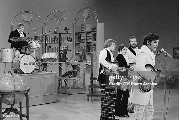 Kenny Rogers and The First Edition appear on The Smothers Brothers Comedy Hour. Standing from left: Terry Williams, Thelma Camacho, Kenny Rogers and...