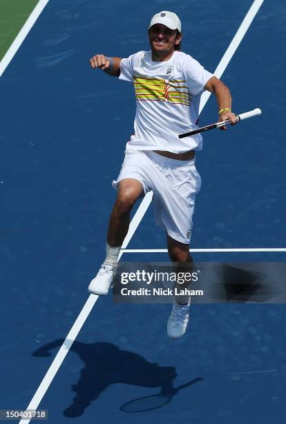 Mardy Fish celebrates match point against Radek Stepanek of the Czech Republic during day six of the Western & Southern Open at Lindner Family Tennis...