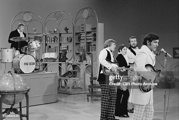 Kenny Rogers and The First Edition appear on The Smothers Brothers Comedy Hour. Standing from left: Terry Williams, Thelma Camacho, Kenny Rogers and...