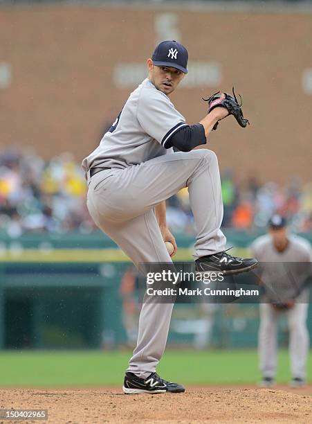 Clay Rapada of the New York Yankees pitches during the game against the Detroit Tigers at Comerica Park on August 9, 2012 in Detroit, Michigan. The...