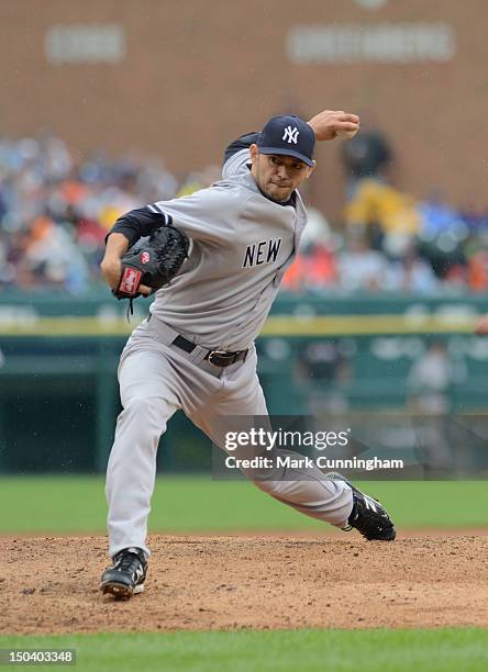 Clay Rapada of the New York Yankees pitches during the game against the Detroit Tigers at Comerica Park on August 9, 2012 in Detroit, Michigan. The...