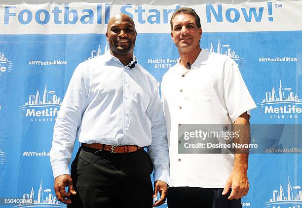 Former Giants wide receiver Amani Toomer and former Jets quarterback Vinny Testaverde attend Random Acts of Football 2012 Snoopy Statue Dedication...