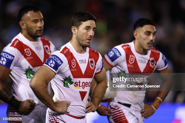 Ben Hunt of the Dragons and team mates look dejected after a Sharks try during the round 18 NRL match between Cronulla Sharks and St George Illawarra...