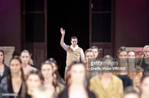 Fashion designer Dries Van Noten walks the runway during the Dries Van Noten Ready to Wear Spring/Summer 2002 fashion show as part of the Paris...