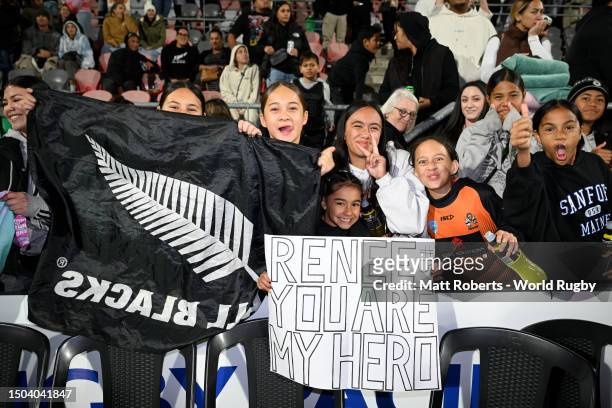 Fans celebrate after the Pacific Four Series & O'Reilly Cup match between the Australian Wallaroos and New Zealand Black Ferns at Kayo Stadium on...