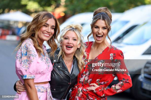 Jana Ina Zarrella, Evelyn Burdecki and Laura Wontorra attend the Vapiano VIP Pre-Party "Italian Kisses" at VAPIANO Berlin Friedrichstrasse on July 5,...