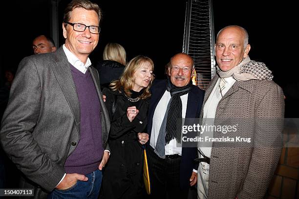 Guido Westerwelle, Angelika Schloendorff, Volker Schloendorff and John Malkovich attend the 'Seefestspiele' Open With Carmen in the Wannseebad on...