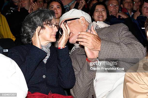 Nicoletta Peyran and her husband John Malkovich attend the 'Seefestspiele' Open With Carmen in the Wannseebad on August 16, 2012 in Berlin, Germany.