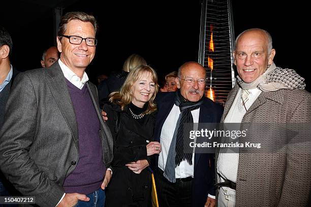 Guido Westerwelle, Angelika Schloendorff, Volker Schloendorff and John Malkovich attend the 'Seefestspiele' Open With Carmen in the Wannseebad on...