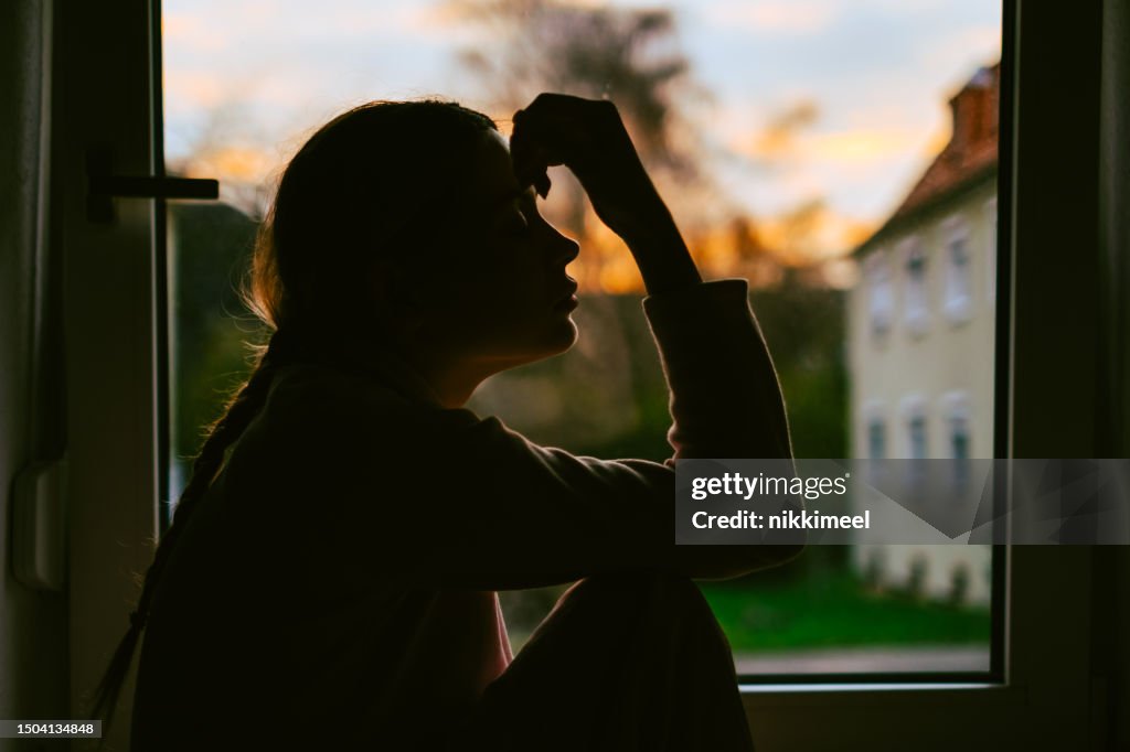 Window Alone Student Young Bored Millennial Woman Looking At Window Alone At Home Fatigue Or ...