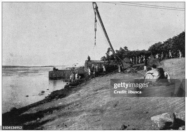 antique image from british magazine: sudan advance, unloading sectional gun-boats - unloading stock illustrations