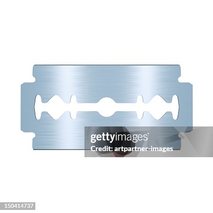 Razorblade on a white background Razorblade on a white background