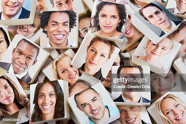 a pile of discs with smiling faces on them - 2012 25 35 stock pictures, royalty-free photos & images