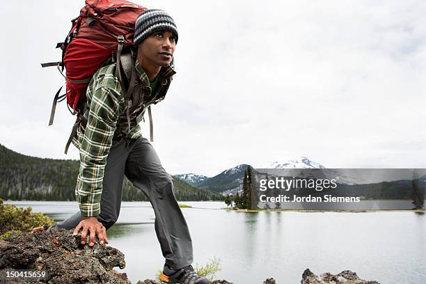 A man hiking with a backpack.
