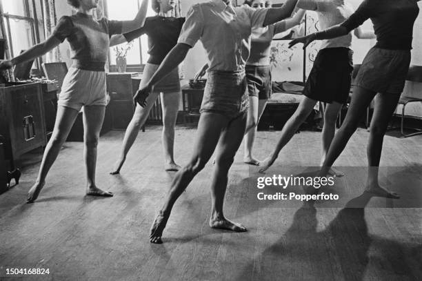 Students from the Lucie Clayton Charm Academy take part in a physical exercise class at the finishing school and modelling agency's premises on...