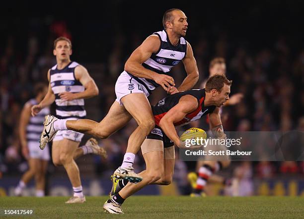 Jason Gram of the Saints and James Podsiadly of the Cats compete for the ball during the round 21 AFL match between the Geelong Cats and the St Kilda...