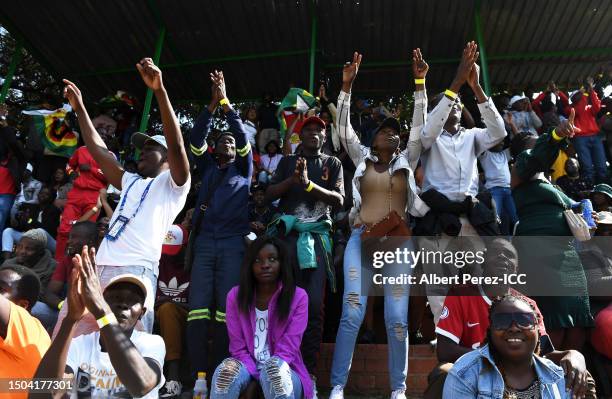 Spectators react in the crowd during the ICC Men's Cricket World Cup Qualifier Zimbabwe 2023 Super 6 match between Zimbabwe and Oman at Queen’s...