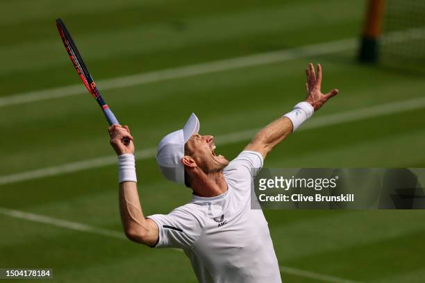 Andy Murray of Great Britain serves during a practice session ahead of The Championships - Wimbledon 2023 at All England Lawn Tennis and Croquet Club...