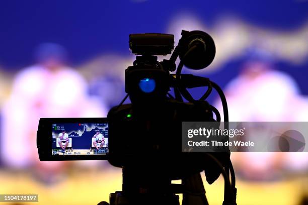 Detail view of Mathieu Van Der Poel of The Netherlands and Jasper Philipsen of Belgium and Team Alpecin-Deceuninck attending to the "Top Riders Press...