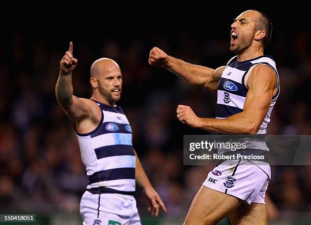 James Podsiadly of the Cats celebrates kicking a goal during the round 21 AFL match between the Geelong Cats and the St Kilda Saints at Etihad...