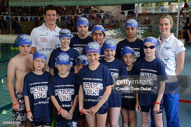 Michael Jamieson together with Hannah Miley and the kids pose for photos during the British Swimming Heroes Tour presented by British Gas on August...