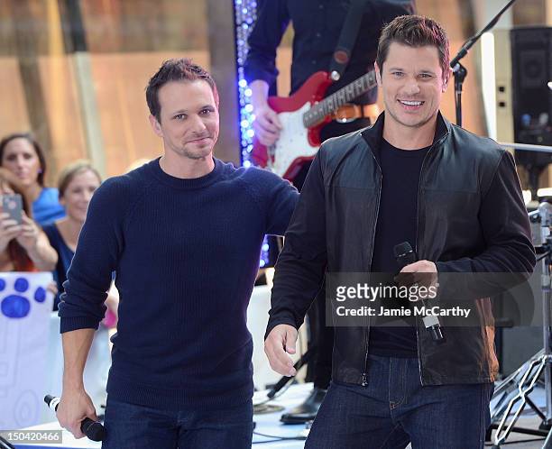 Drew Lachey and Nick Lachey of 98 Degrees perform on NBC's "Today" at Rockefeller Plaza on August 17, 2012 in New York City.