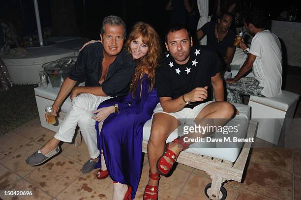 Mario Testino, Charlotte Tilbury and guest attend the Ibiza Summer Party In Aid Of Teenage Cancer Trust and Asociacion Espanola Contra El Cancer at...