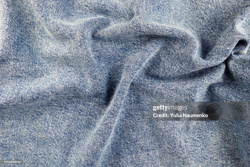 Denim fabric texture. Full frame of jeans.
