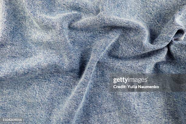 denim fabric texture. full frame of jeans. - jeans stock pictures, royalty-free photos & images