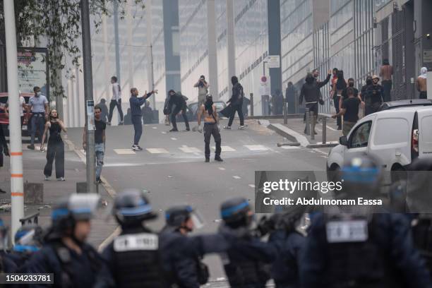 Protestors clash with French police after a memorial march for French teenager Nahel, shot by police during a traffic control stop several days ago,...