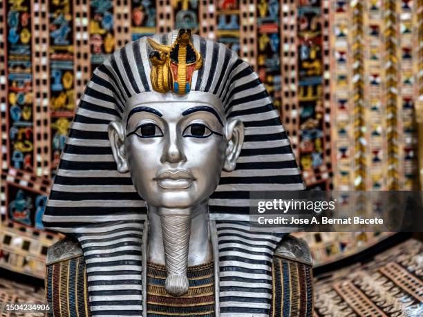 replica of tutankhamun's mask to sell as a souvenir to tourists. - tutankhamen stock pictures, royalty-free photos & images