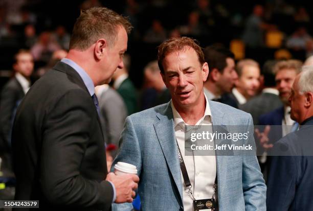 Rob Blake of the Los Angeles Kings and Joe Sakic of the Colorado Avalanche talk on the draft floor during the 2023 Upper Deck NHL Draft - Rounds 2-7...