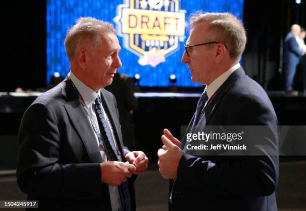 Ken Holland of the Edmonton Oilers and Pat Verbeek of the Anaheim Ducks talk on the draft floor during the 2023 Upper Deck NHL Draft - Rounds 2-7 at...