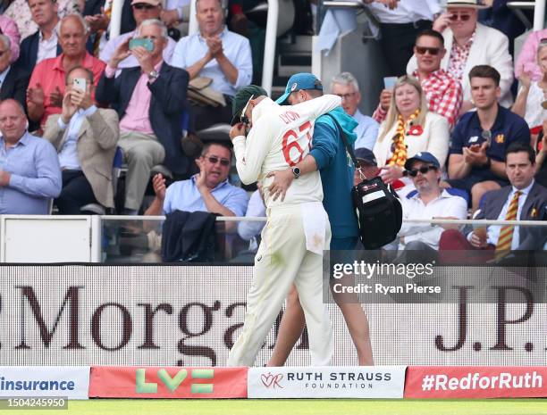 Nathan Lyon of Australia leaves the field injured during Day Two of the LV= Insurance Ashes 2nd Test match between England and Australia at Lord's...